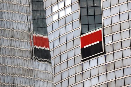 FILE PHOTO: The logo of French bank Societe Generale is seen on the company's headquarters in Puteaux at the financial and business district of La Defense near Paris, outside Paris, France, May 14, 2018. REUTERS/Charles Platiau/File Photo