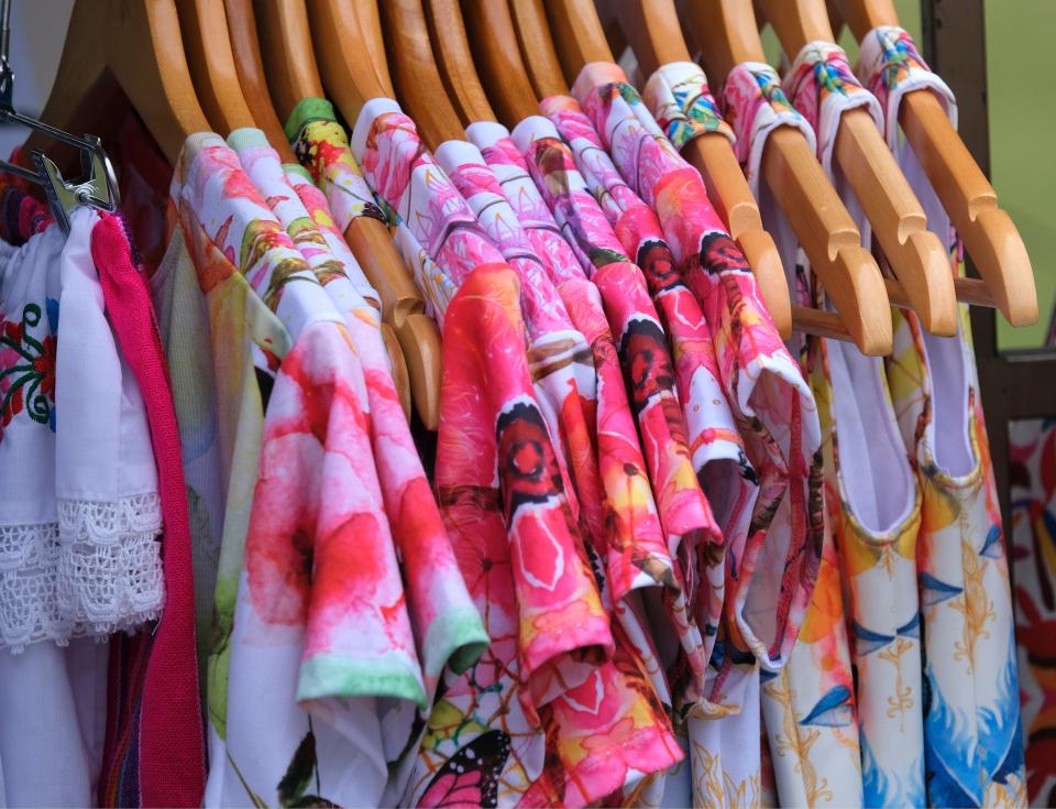 Colorful clothes are displayed in a booth during the 2021 Cinco de Mayo celebration at Scissortail Park.