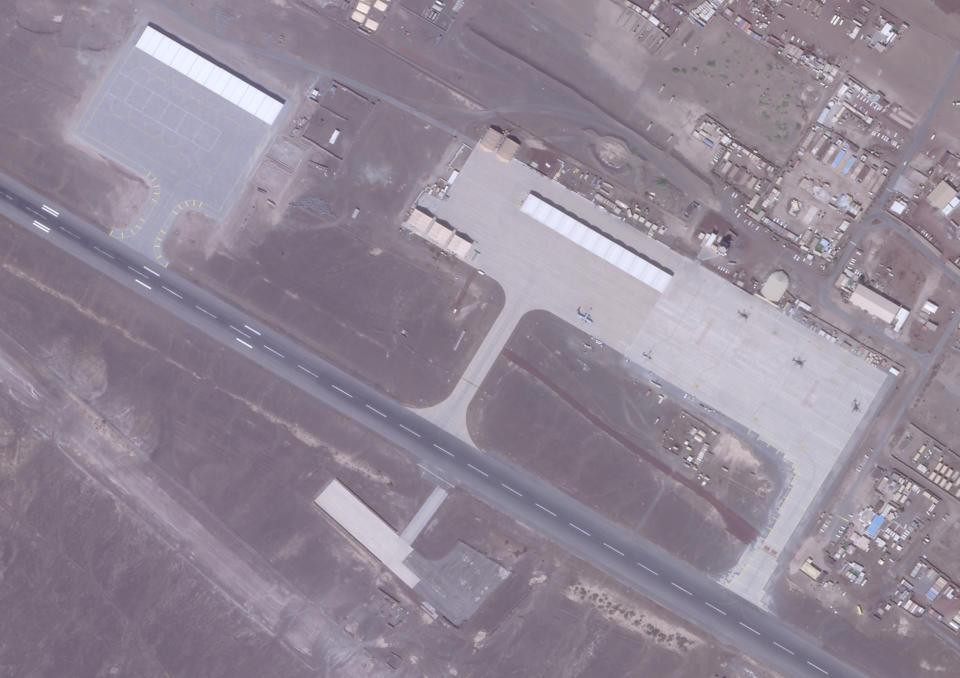 A Jan. 7, 2021, satellite photo from Planet Labs Inc. shows canopies to cover aircraft at an Emirati military base in Assab, Eritrea. The United Arab Emirates is dismantling parts of a military base it runs in the East African nation of Eritrea after it pulled back from the grinding war in nearby Yemen, satellite photos analyzed by The Associated Press show. (Planet Labs Inc. via AP)