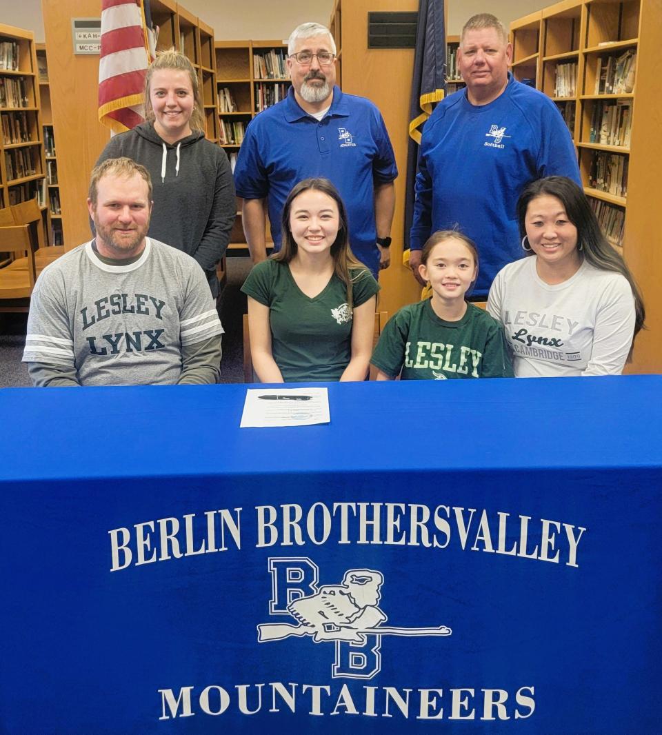 Berlin Brothersvalley senior Rori Allen, front row center, announces her intentions at attend at play softball at Division III Lesley University, Dec. 20, in Berlin. Allen is flanked by parents Russell and Amanda Webreck, along with sister Lana Webreck. In back, from left, Berlin assistant softball coach Tess Straight, head coach Brian Slope and assistant coach Steve Costea.