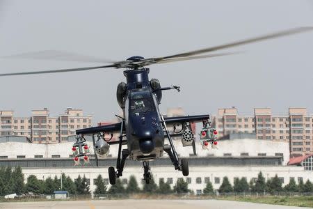 Chinese-developed attack helicopter Z-19E is pictured during its maiden flight in Harbin, Heilongjiang province, China May 18, 2017. REUTERS/China Daily
