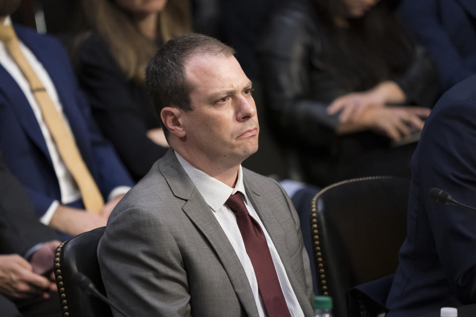 Derek Slater, global director of information policy at Google, listens before testifying at a Senate Commerce, Science and Transportation Committee hearing on how internet and social media companies are prepared to thwart terrorism and extremism, Wednesday, Sept. 18, 2019, on Capitol Hill in Washington. (AP Photo/J. Scott Applewhite)