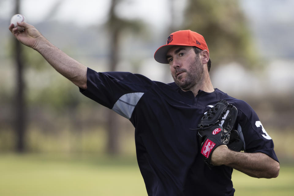 FILE - Detroit Tigers pitcher Justin Verlander throws during a spring training baseball workout Feb. 15, 2017, in Lakeland, Fla. Long before he became a three-time Cy Young Award winner, Verlander was a high schooler who could not consistently muster the arm strength needed to get drafted. So he went to college, took the time he required to mature as a pitcher via traditional training methods, and eventually developed an arm that pushed him from prospect into major leaguer and ultimately an ace. (AP Photo/Matt Rourk, File)