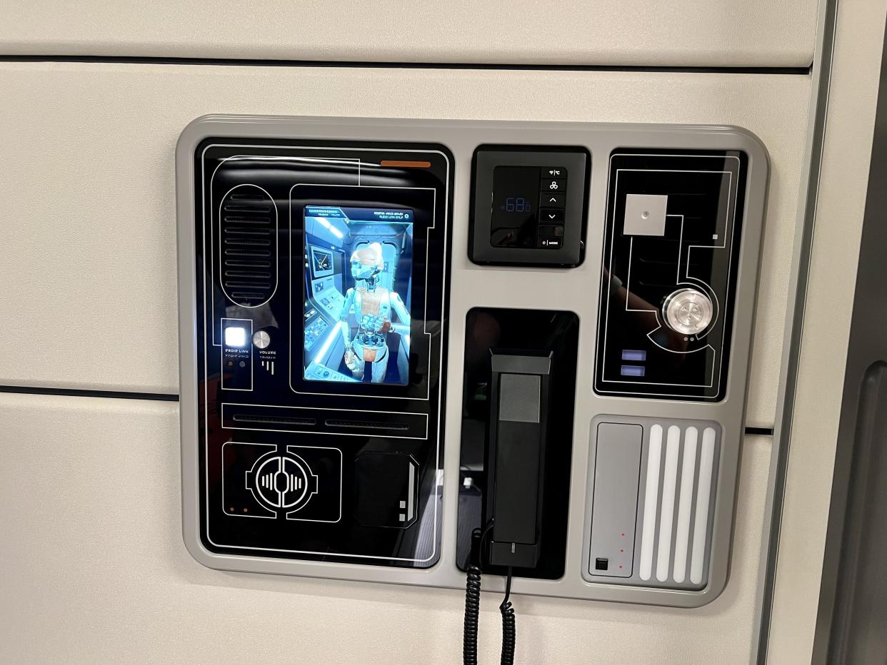 D3-09, the in-room logistics droid, greets passengers at arrival and transmits messages to the staterooms throughout the day. (Photo: Terri Peters)