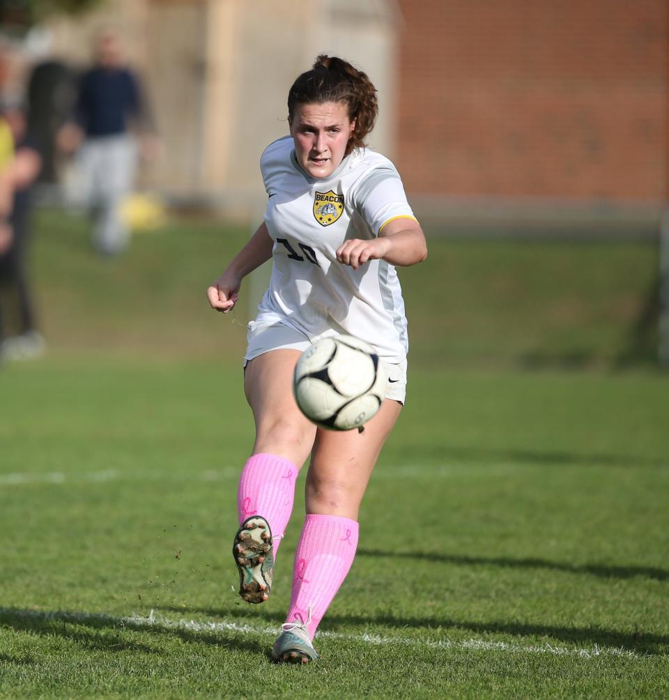 Beacon's Devyn Kelly sends a pass up field against Red Hook during a Section 9 Class A girls soccer semifinal on Oct. 25, 2023.