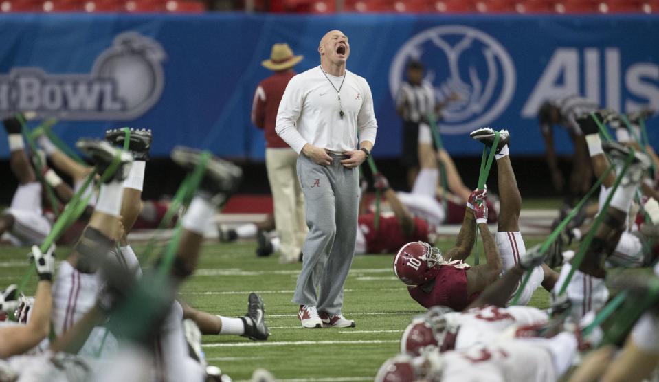 Alabama director of strength and conditioning coach Scott Cochran works with his players during Alabama’s Peach Bowl football practice, Tuesday, Dec. 27, 2016, at the Georgia Dome in Atlanta, Ga. (Vasha Hunt//AL.com via AP)