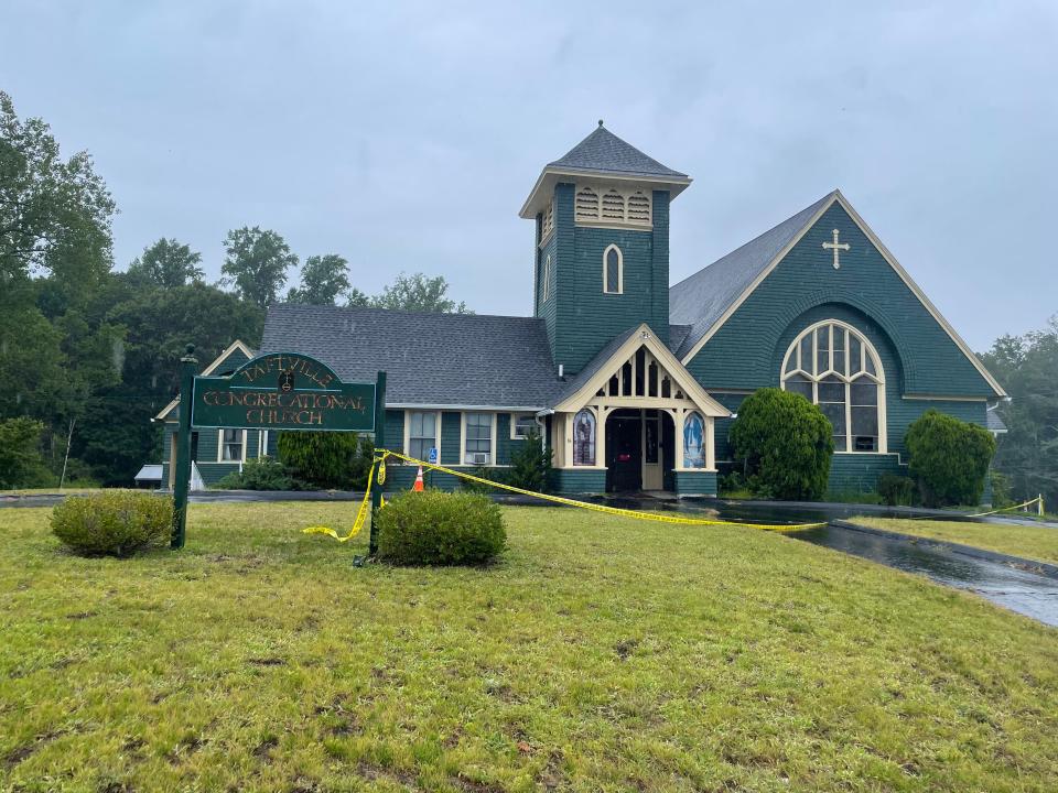 Front of the former Taftville Congregational Church. Most of the fire damage visible from the outside is on the back and side