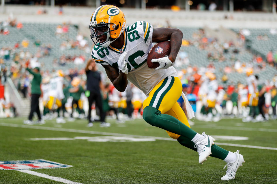 Aug 11, 2023; Cincinnati, Ohio, USA; Green Bay Packers wide receiver Grant DuBose (86) runs with the ball during warmups prior to the game against the <a class="link " href="https://sports.yahoo.com/nfl/teams/cincinnati/" data-i13n="sec:content-canvas;subsec:anchor_text;elm:context_link" data-ylk="slk:Cincinnati Bengals;sec:content-canvas;subsec:anchor_text;elm:context_link;itc:0">Cincinnati Bengals</a> at Paycor Stadium. Mandatory Credit: Katie Stratman-USA TODAY Sports