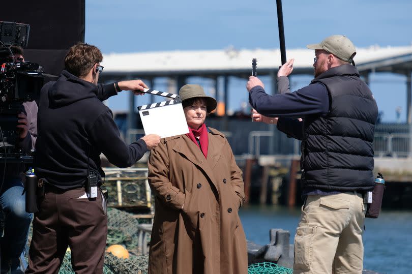 ITV production crew filming Vera lead actress Brenda Blethyn and co-star David Leon on location by the River Tyne at North Shields Fish Quay