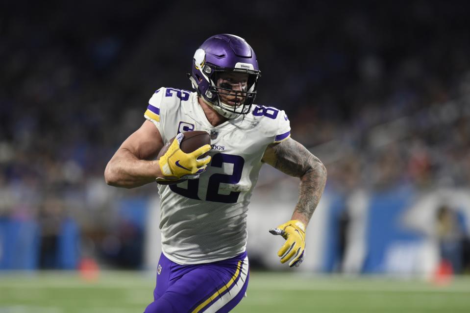 FILE - In this Dec. 23, 2018, file photo, Minnesota Vikings tight end Kyle Rudolph runs into the end zone untouched for a touchdown during the second half of an NFL football game against the Detroit Lions in Detroit. Rudolph has had a pretty stable career with just the Vikings, but he was involved in at least one significant trade. In his father's fantasy football keeper league.(AP Photo/Jose Juarez, File)
