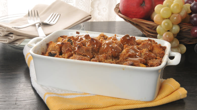 bread pudding with caramel topping on table