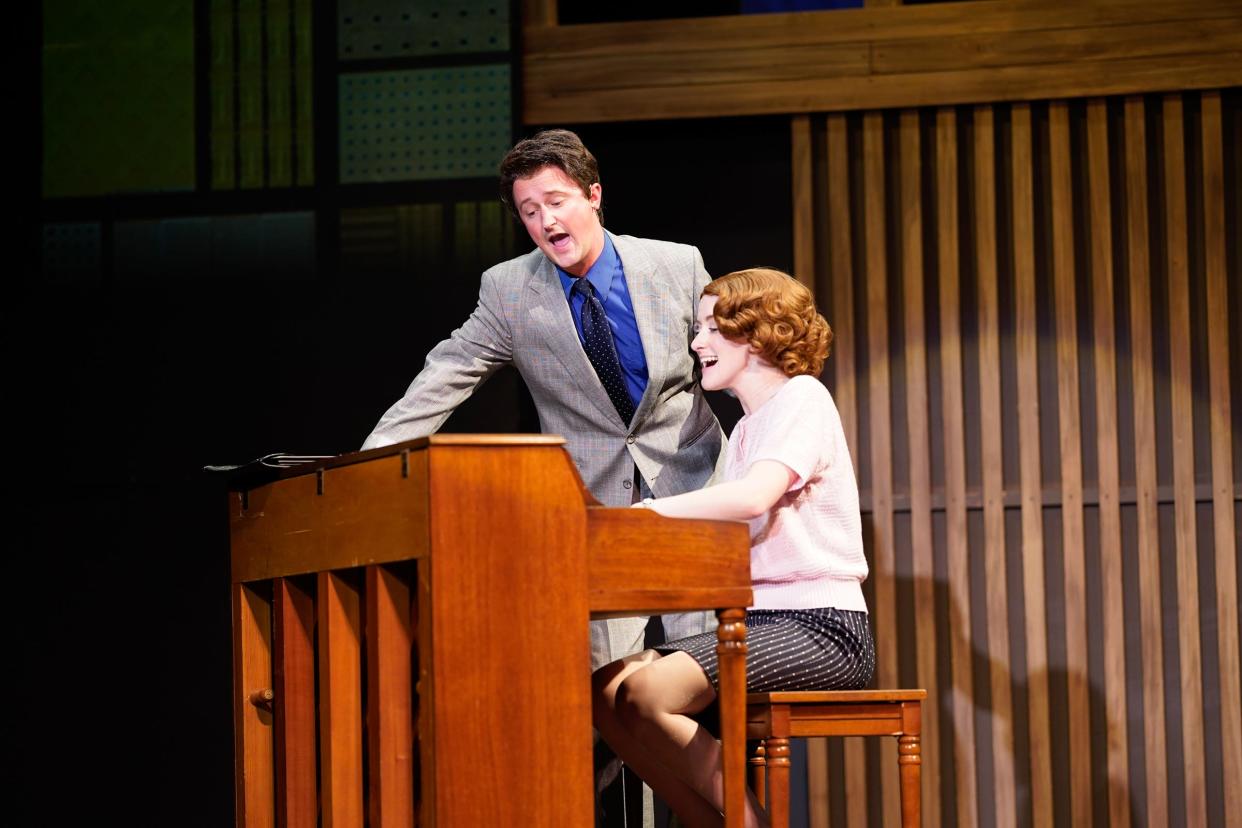 Emma Skaggs as Carole King and Steven Kiss as her husband and songwriting partner Gerry Goffin compose a song in a scene from “Beautiful: The Carole King Musical” at the Croswell Opera House.