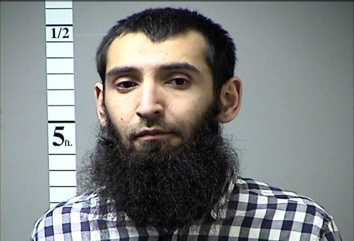 Authorities in New York City identified 29-year-old Sayfullo Saipov as the man responsible for a deadly truck attack that <a href="https://www.huffingtonpost.com/entry/lower-manhattan-shooting_us_59f8cdabe4b046017faf668e" target="_blank">left eight people dead</a> and nearly a dozen injured.<br /><br />According to police, on Oct. 31, Saipov drove a rented pickup truck onto the Hudson River Park's bike path in lower Manhattan and <a href="https://www.huffingtonpost.com/entry/photos-new-york-city-truck-attack_us_59f8e5a5e4b0d1cf6e9131e0" target="_blank">intentionally steered the vehicle</a> into cyclists and runners.<br /><br />After traveling about a mile, the truck crashed into a school bus. Police say Saipov was shot in the abdomen when he exited the vehicle wielding what were later determined to be a paintball gun and a pellet gun. Authorities allegedly found evidence in the truck indicating his allegiance to terrorist groups.<br /><br />Saipov, who immigrated to the United States from Uzbekistan in 2010, pleaded not guilty in November to numerous criminal charges, including eight counts of murder. He is awaiting trial.