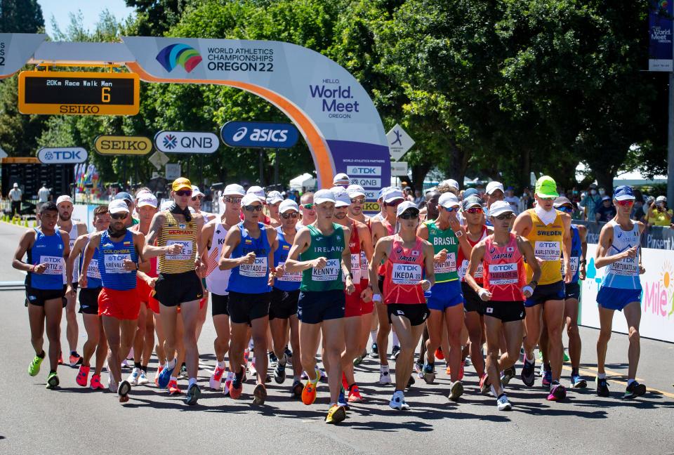 Walkers take off from the start line of the men’s 20 kilometer race walk on Martin Luther King Jr. Blvd. on the opening day of the World Athletics Championships Friday, July 15, 2022, in Eugene, Ore. 