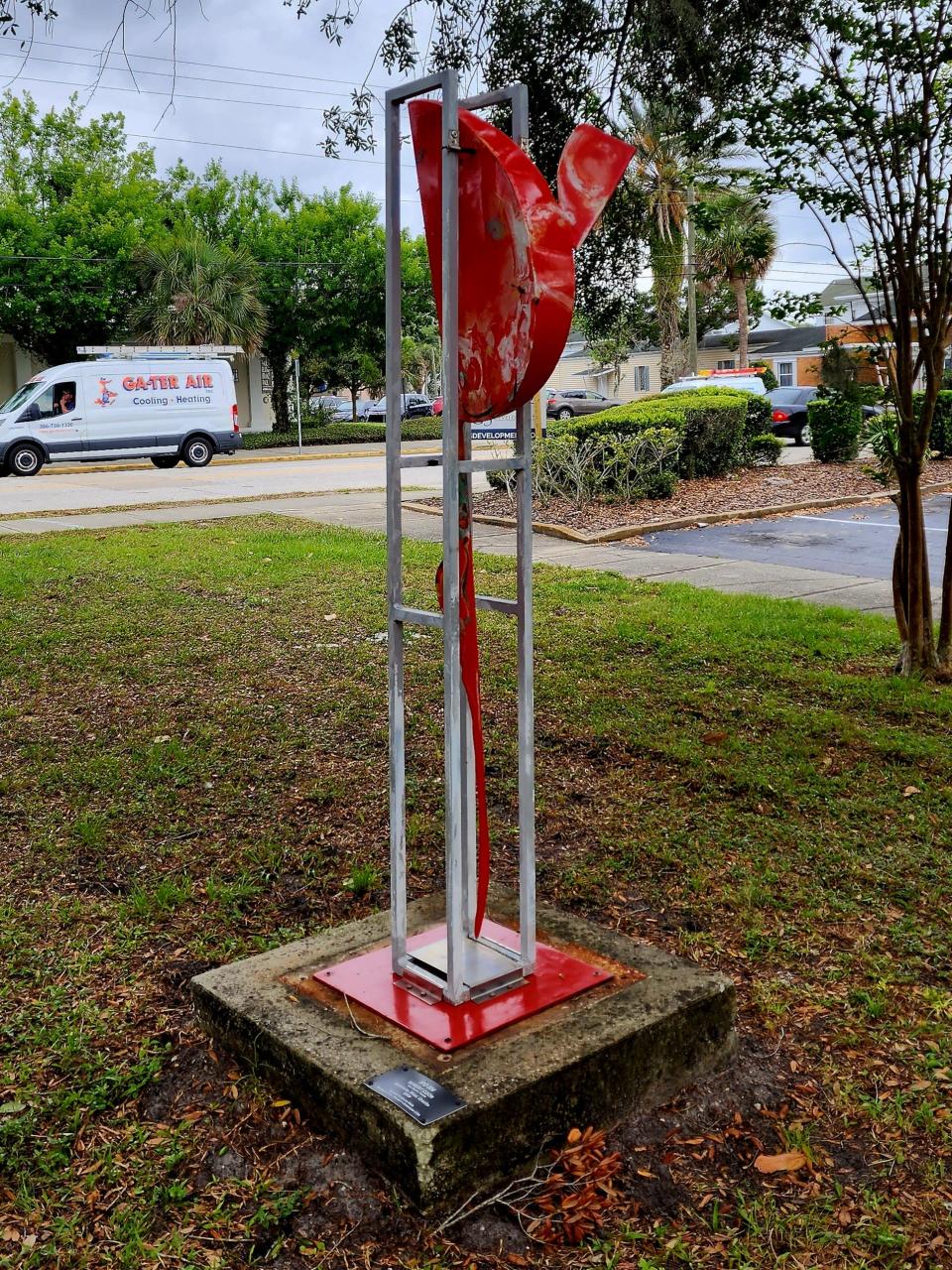 "IPO 004," an aluminum, steel and granite piece by Robert Coon, of Vero Beach, is pictured here off the DeLand Greenway at the northwest corner of the intersection of East New York and North Alabama avenues.