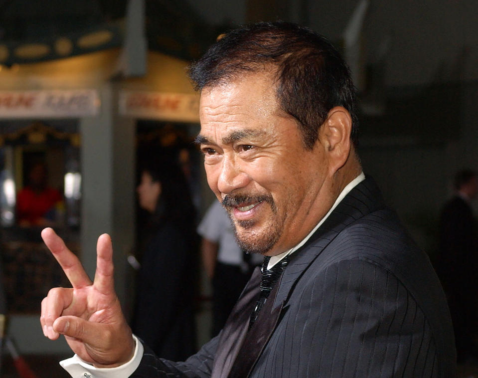 FILE - Japanese actor Sonny Chiba arrives for the premiere of the film "Kill Bill: Volume 1" at the Grauman's Chinese Theatre in the Hollywood section of Los Angeles on Sept. 29, 2003. Chiba, known in Japan as Shinichi Chiba, who wowed the world with his martial arts skills, acting in more than 100 films, including "Kill Bill," died Aug. 19, 2021. He was 82. (AP Photo/Kevork Djansezian, File)