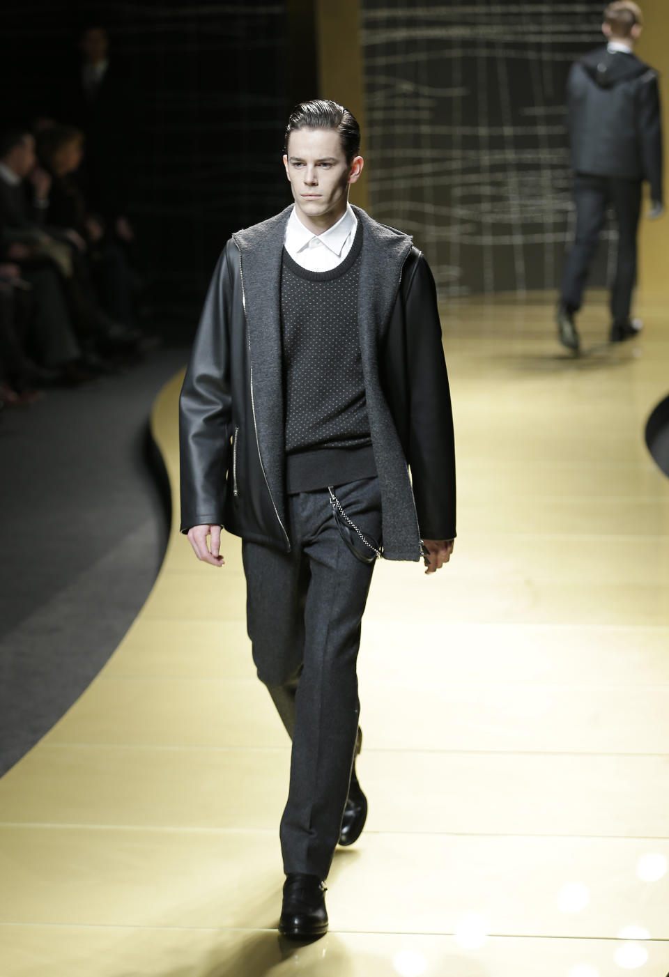 A model wears a creation of Ermenegildo Zegna men's Fall-Winter 2013-14 collection, part of the Milan Fashion Week, unveiled in Milan, Italy, Saturday, Jan. 12, 2013. (AP Photo/Antonio Calanni)