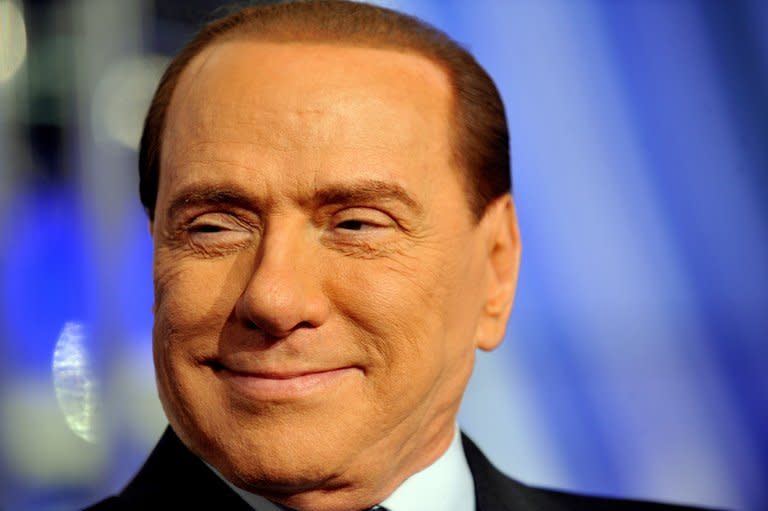 Former Italian Prime Minister Silvio Berlusconi is pictured on an RAI 1 television set on 9 January 2013 in Rome. The verdict in Berlusconi's trial for underage sex will not come before the February general elections, a court has said