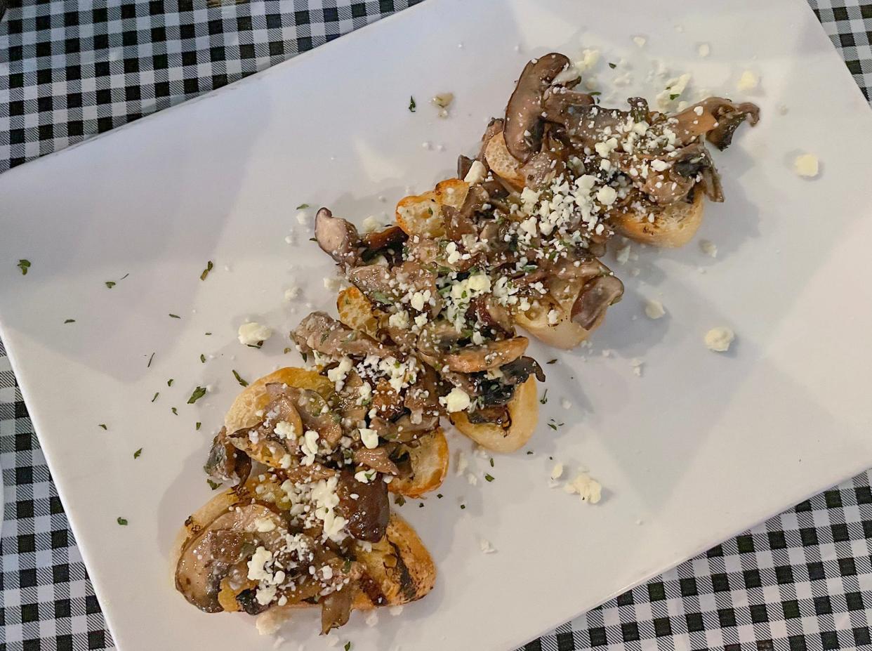 Bruscetta with mushrooms and feta cheese at Osteria Athena restaurant in Athens, Ga. on July 23, 2023.