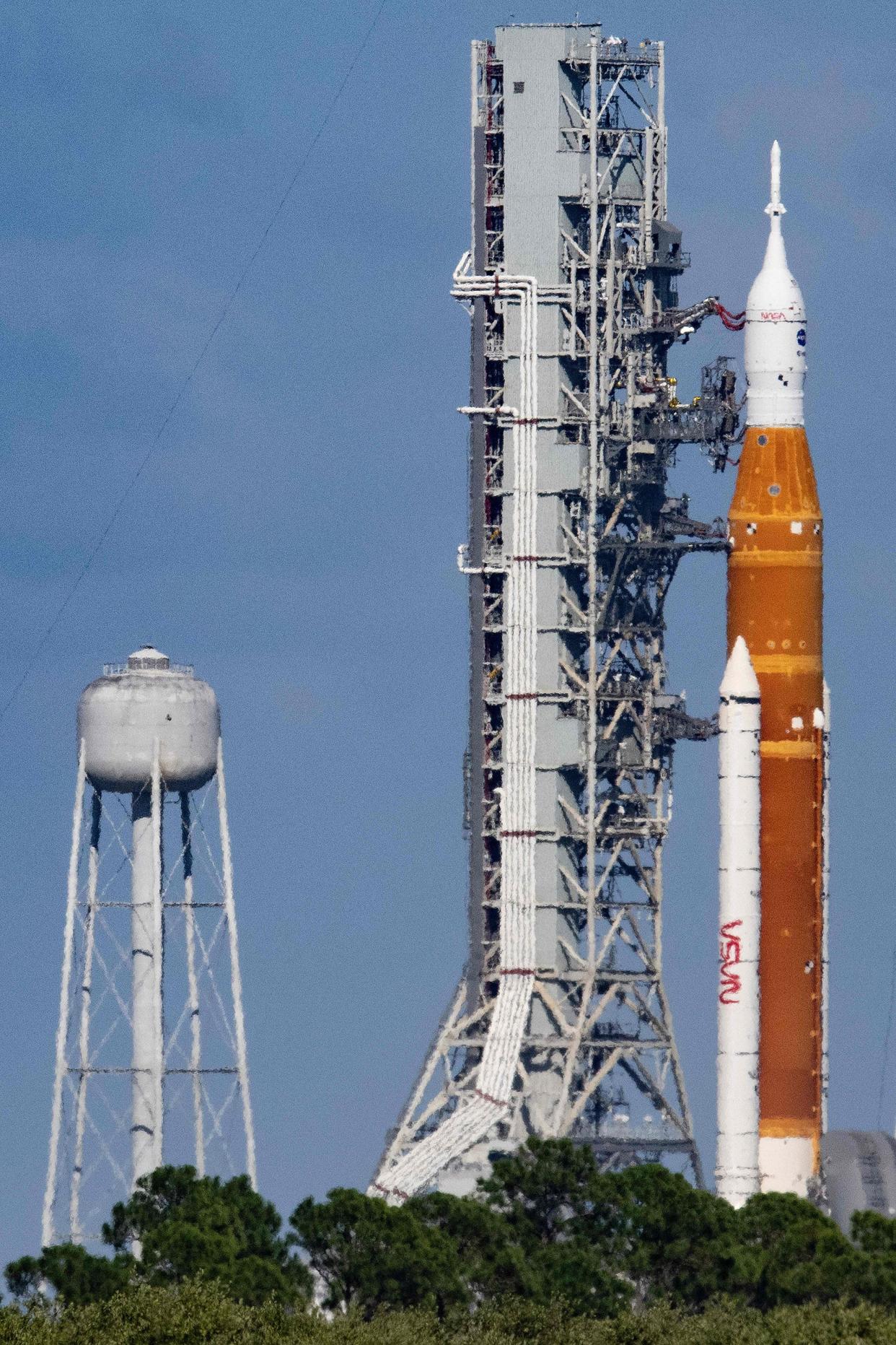 The Artemis I unmanned lunar rocket sits on launch pad 39B at NASA's Kennedy Space Center in Cape Canaveral, Fla. on Sept. 24, 2022. NASA has called off the scheduled Sept. 27, 2022, launch of its historic uncrewed mission to the Moon due to a tropical storm that is forecast to strengthen as it approaches Florida. "NASA is forgoing a launch opportunity... and preparing for rollback (from the launchpad), while continuing to watch the weather forecast associated with Tropical Storm Ian," NASA said on Saturday.