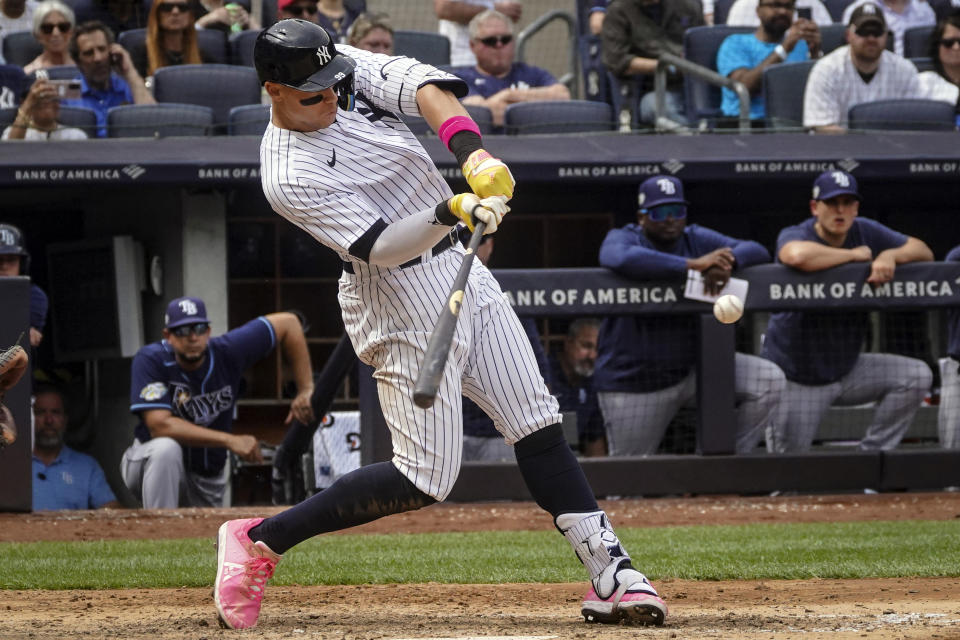 New York Yankees' Aaron Judge hits a two-run homer in the sixth inning of a baseball game against Tampa Bay Rays, Saturday, May 13, 2023, in New York. (AP Photo/Bebeto Matthews)