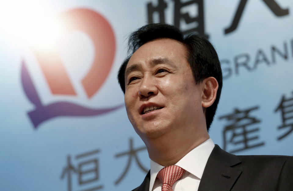 How Evergrande's rags-to-riches founder Hui Ka Yan is trying to save his empire. (PHOTO: REUTERS/Bobby Yip)