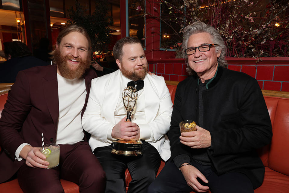 Wyatt Russell, Paul Walter Hauser andKurt Russell seen at the Apple TV+ Emmy Awards post ceremony reception at Mother Wolf on January 15, 2024 in Los Angeles, California.