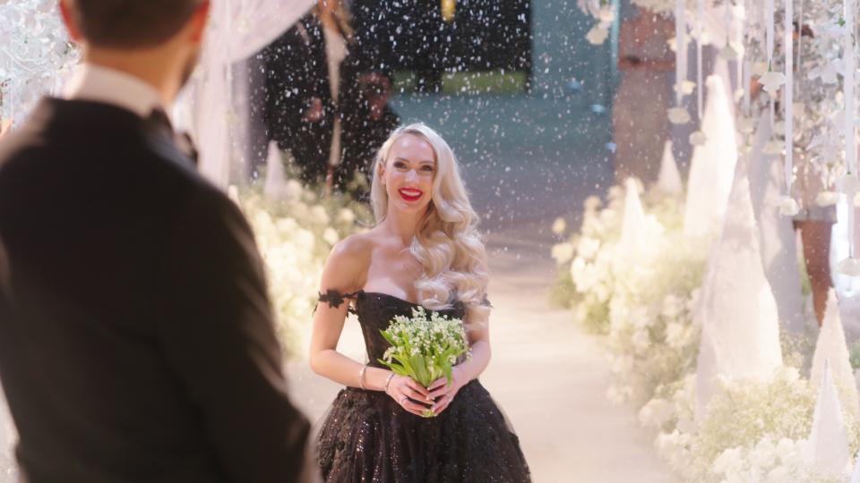 Christine Quinn wearing a black dress during her lavish 2019 wedding ceremony with Christian Dumontet