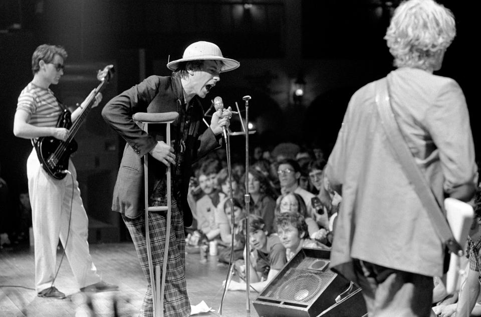 ATLANTA - APRIL 24: (L-R) Bassist John Wordle (AKA Jah Wobble), vocalist John Lydon (formerly Johnny Rotten) and guitarist Keith Levene of Public Image Limited (PiL) perform at the Agora Ballroom on April 24, 1980 in Atlanta, Georgia. (Photo by Tom Hill/WireImage)