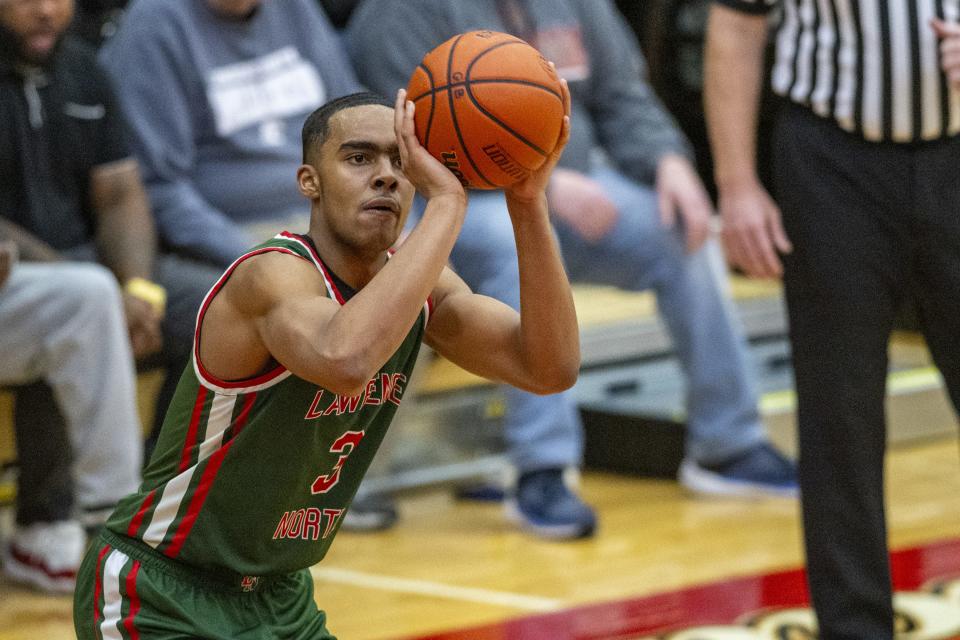 Lawrence North High School sophomore Brennan Miller (3) shoots during the second half of a Boysâ€™ Marion County Basketball Tournament championship game against Franklin Central High School, Saturday, Jan. 13, 2024, at Southport High School. Lawrence North won, 78-53.