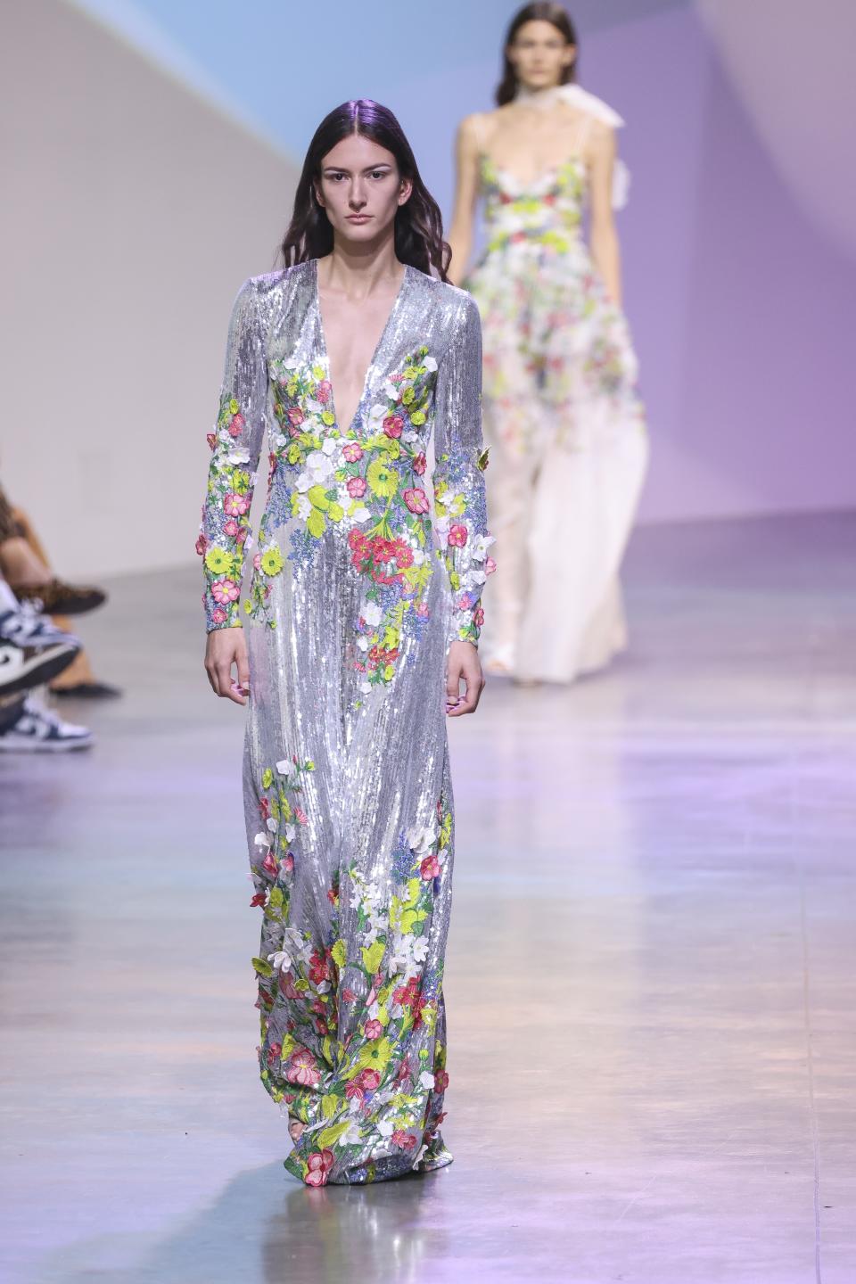 A model wears a creation for the Elie Saab ready-to-wear Spring/Summer 2023 fashion collection presented Saturday, Oct. 1, 2022 in Paris. (Photo by Vianney Le Caer/Invision/AP)