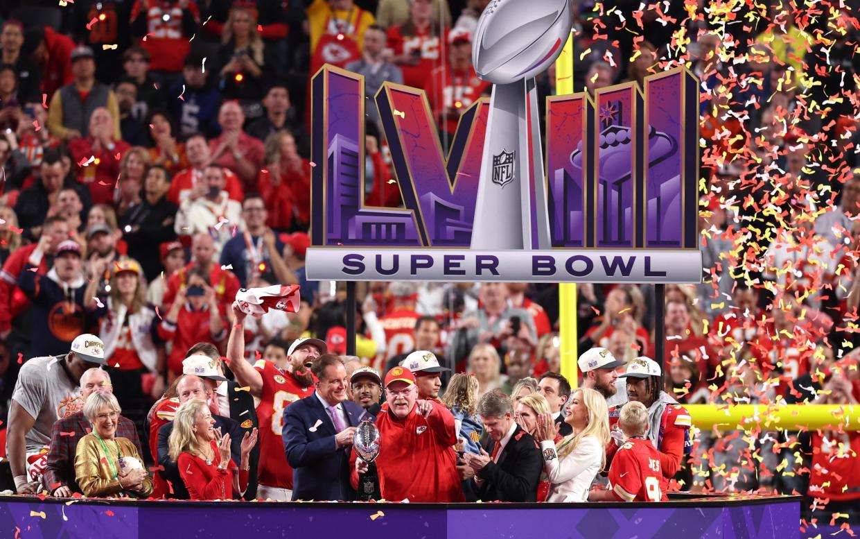 Chiefs head coach Andy Reid lifts the Vince Lombardi trophy