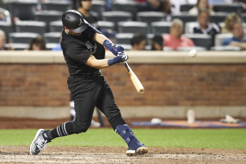 Atlanta Braves' Francisco Cervelli hits an RBI double during the ninth inning of the team's baseball game against the New York Mets, Saturday, Aug. 24, 2019, in New York. (AP Photo/Mary Altaffer)