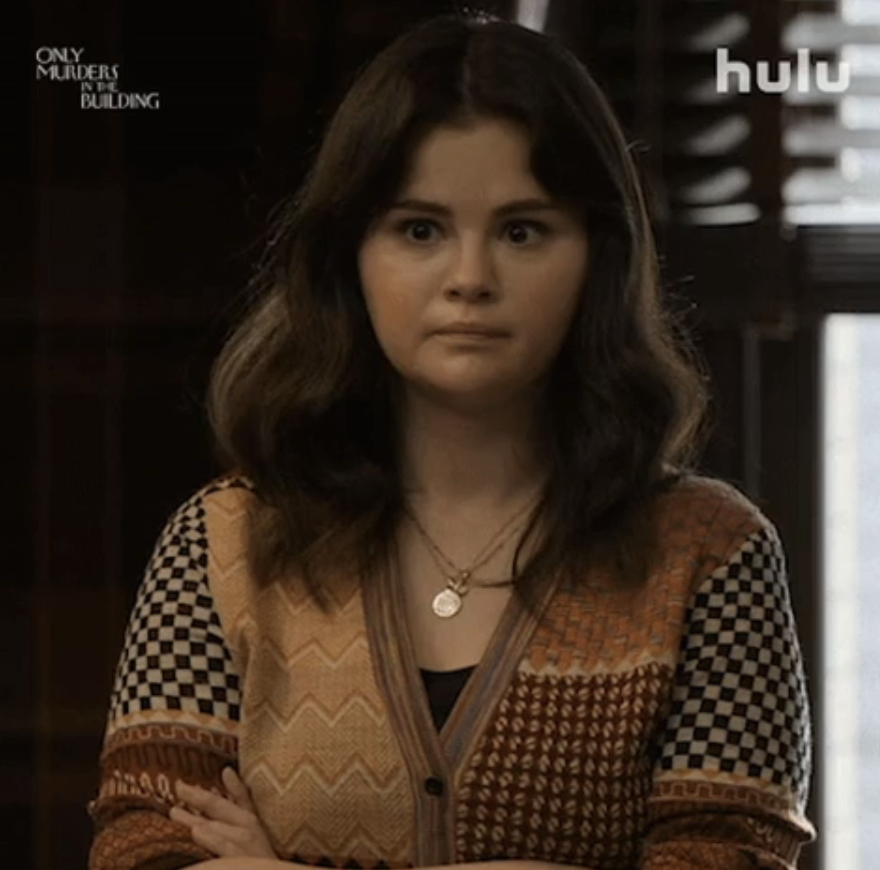 Selena Gomez on "Only Murders in the Building" staring ahead in concern