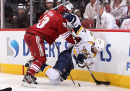 GLENDALE, AZ - MAY 07: Alexander Radulov #47 of the Nashville Predators is knocked down by Adrian Aucoin #33 of the Phoenix Coyotes as he attempts to control the puck in Game Five of the Western Conference Semifinals during the 2012 NHL Stanley Cup Playoffs at Jobing.com Arena on May 7, 2012 in Glendale, Arizona. (Photo by Christian Petersen/Getty Images)