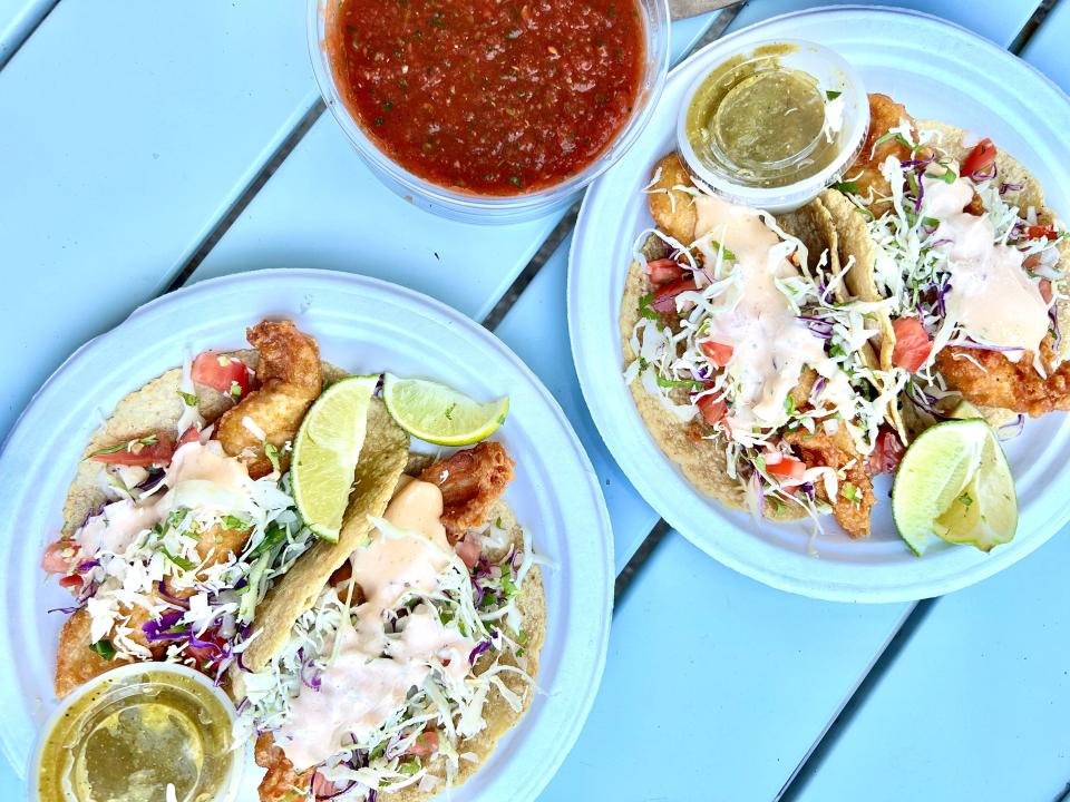 Fish tacos from Frida's Cocina are topped with finely shredded coleslaw, cilantro and creamy chipotle sauce, all on fresh-made corn tortillas.