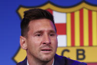 Lionel Messi speaks during a press conference at the Camp Nou stadium in Barcelona, Spain, Sunday, Aug. 8, 2021. FC Barcelona had previously announced the negotiations with Lionel Messi had ended and that Messi would be leaving the club. (AP Photo/Joan Monfort)