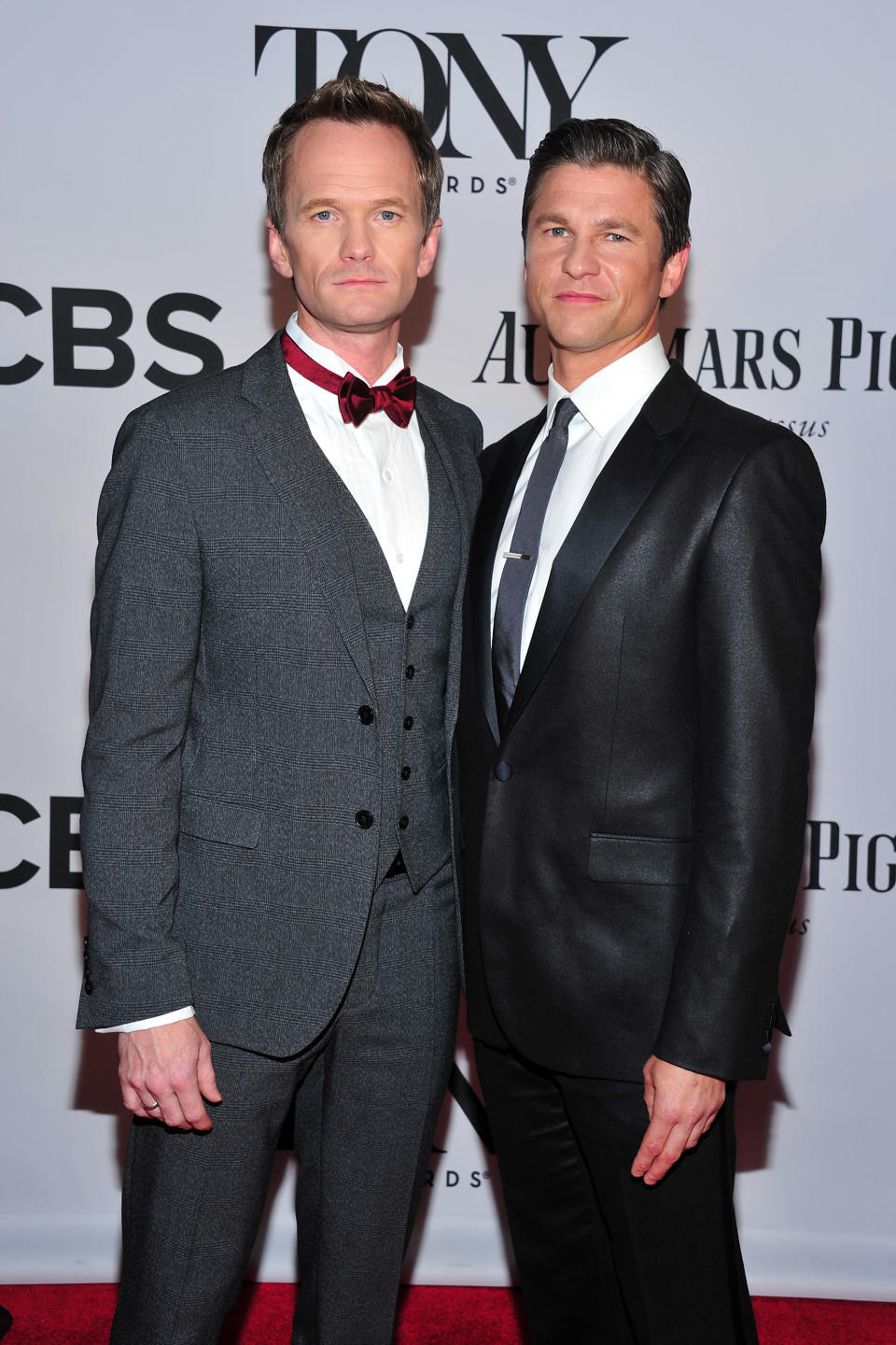 Neil Patrick Harris, left, and David Burtka arrives on the red carpet at the 67th Annual Tony Awards, on Sunday, June 9, 2013 in New York. (Photo by Charles Sykes/Invision/AP)