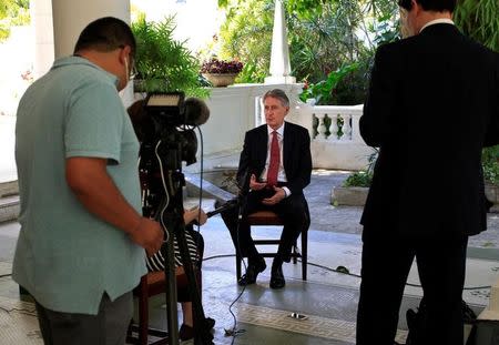 Britain's Foreign Secretary Philip Hammond talks to Reuters during an interview in Havana, Cuba, April 29, 2016. REUTERS/Enrique de la Osa