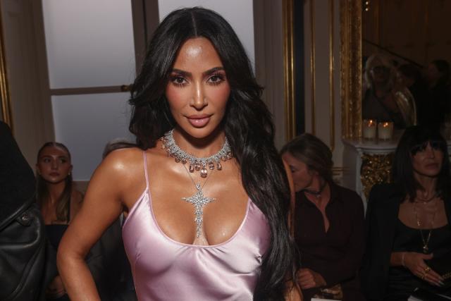 Kim Kardashian attempts to cover up nipples in see-through black bra for  racy new SKIMS ad