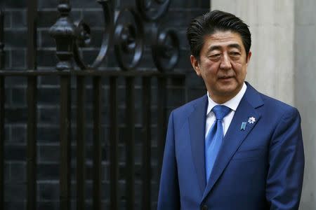 Japan's Prime Minister Shinzo Abe leaves Number 10 Downing Street after meeting with his British counterpart David Cameron in London, Britain May 5, 2016. REUTERS/Stefan Wermuth