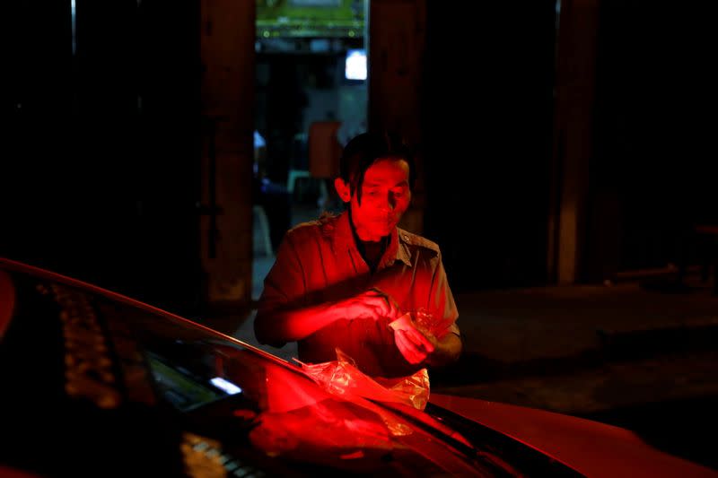 The Wider Image: In old Bangkok, a goddess resists a wave of gentrification