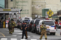 <p>Police officers and NJ firefighters arrive to the train terminal after a New Jersey Transit train crashed into the platform at Hoboken Terminal during morning rush hour September 29, 2016 in Hoboken, New Jersey. (Eduardo Munoz Alvarez/Getty Images) </p>