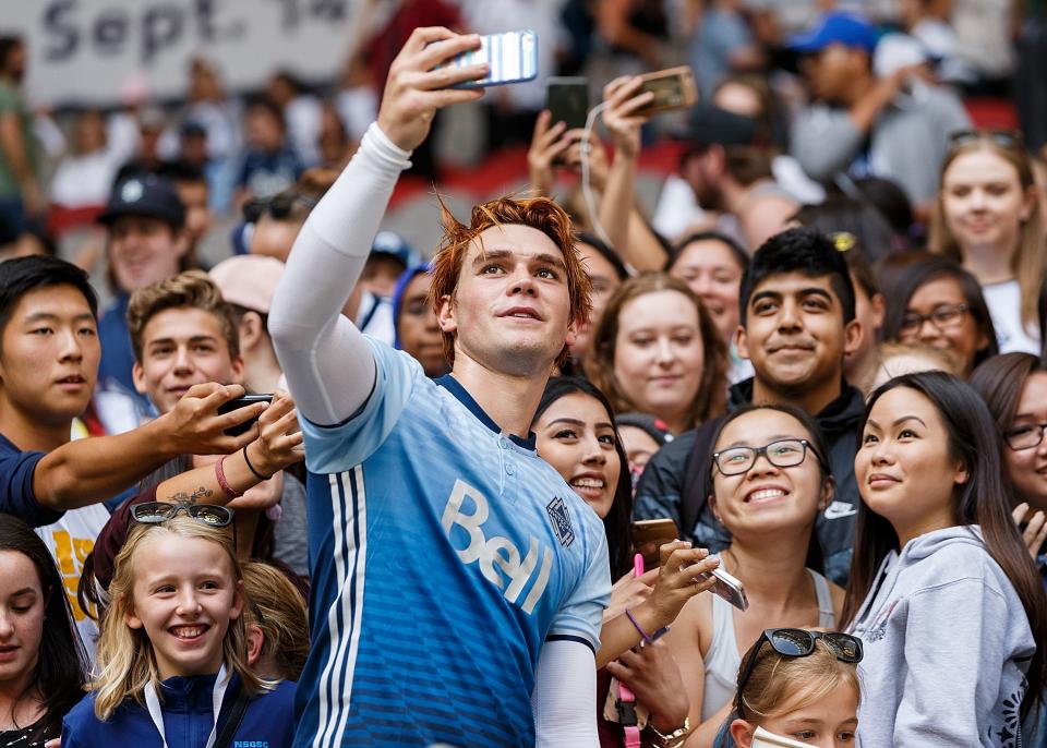 Actor KJ Apa takes a selfie with fans after the Legends And Stars: Whitecaps FC Charity Alumni match at BC Place on September 16, 2017 in Vancouver, Canada.