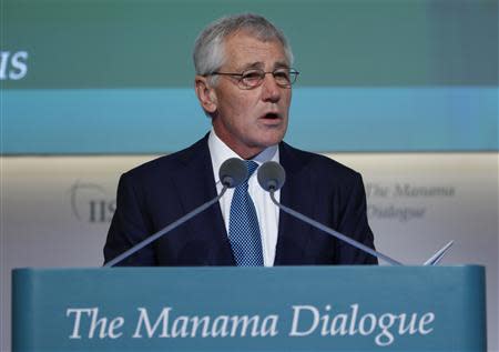 U.S. Defense Secretary Chuck Hagel speaks at the IISS Regional Security Summit - The Manama Dialogue, in Manama, December 7, 2013. REUTERS/Hamad I Mohammed