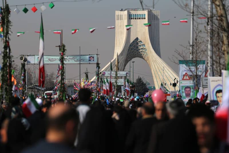 Iranian people take part in a rally marking the 45th anniversary of the Islamic Revolution in Tehran. Rouzbeh Fouladi/ZUMA Press Wire/dpa