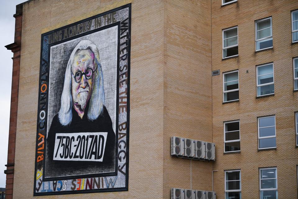 A mural based on a portrait by Byrne of Billy Connolly on a wall in Osborne Street, Glasgow