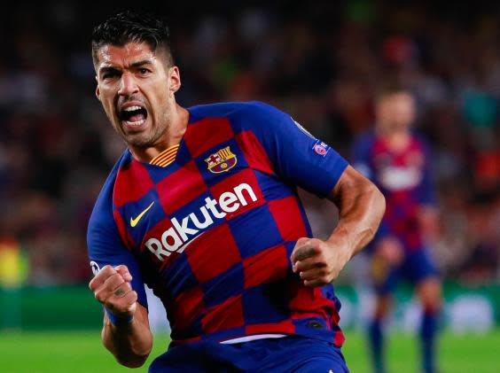 Luis Suarez celebrates his late winner to complete Barcelona's comeback against Inter Milan (Getty)