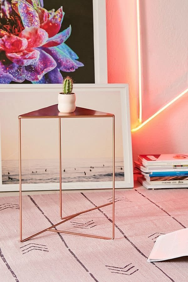 Get it from <a href="https://www.urbanoutfitters.com/shop/triangle-side-table" target="_blank">Urban Outfitters</a>.&nbsp;