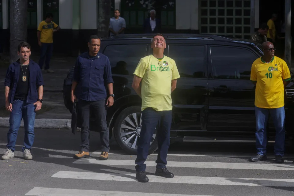 Brazil&#39;s President and presidential candidate Jair Bolsonaro looks on at a polling station in Rio de Janeiro, Brazil October 30, 2022. REUTERS/Ricardo Moraes